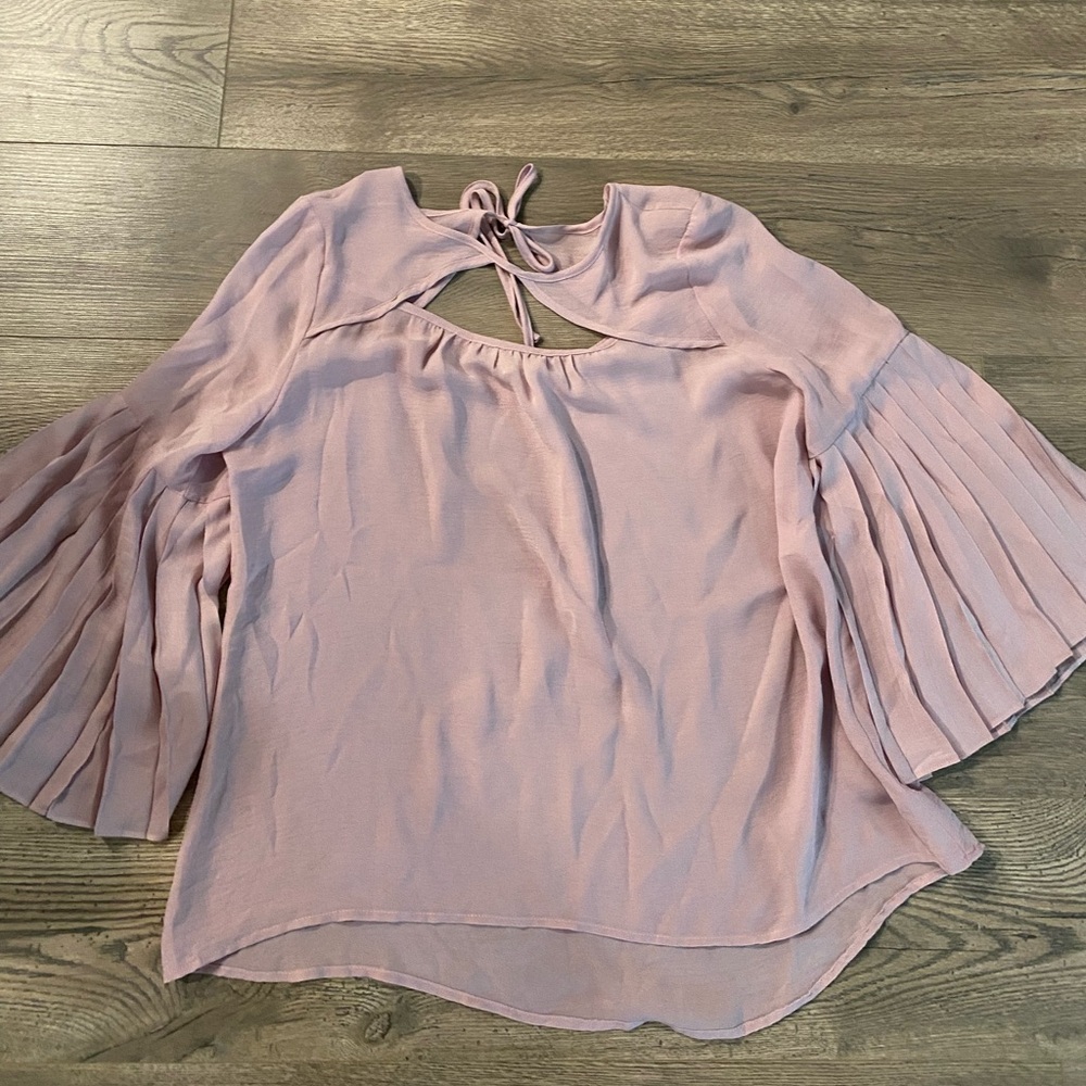 Boutique top with accordion sleeves
